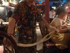 -老牌坊云南鱼豆花火锅(哈西万达店)
