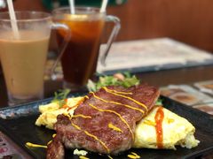 咖喱吉列猪扒蛋包饭-阿飛冰室(下沙店)