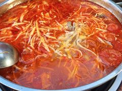-黄利砖万峰林布依特色酸笋牛肉馆