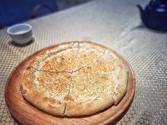 馕坑芝麻馕-巴扎美食·新疆菜·西域歌舞表演餐厅(新疆大厦店)