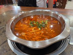 -黄利砖万峰林布依特色酸笋牛肉馆