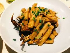 梭子蟹炒年糕-卯时·龙光雅宴·精致锡帮菜(惠山古镇店)