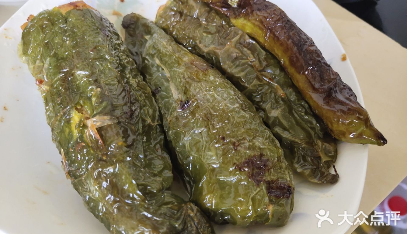 炸的时候也先炸开口来封上，之后就小火慢炸，真的很慢啊
