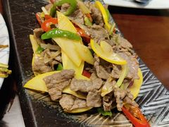 酸木瓜炒牛肉-紫滇源云南生态菜(丹凤街店)