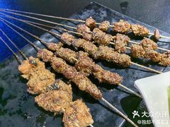 -明何记涮牛肚(品牌首店隋唐植物园南门古城路店)