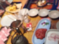 -老牌坊云南鱼豆花火锅(哈西万达店)