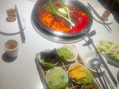 -茅草房·河畔园林火锅