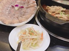 -明何记涮牛肚(品牌首店隋唐植物园南门古城路店)