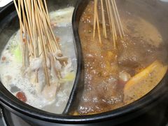 -明何记涮牛肚(品牌首店隋唐植物园南门古城路店)