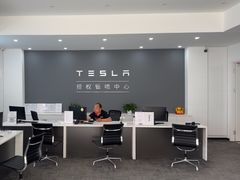 -北亚国超特斯拉授权钣喷中心