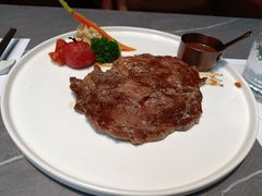 谷饲肉眼牛排-洛缦音乐餐厅(工业展览馆万象城店)