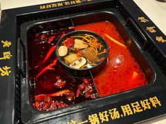 番茄麻辣锅-老牌坊云南鱼豆花火锅(哈西万达店)