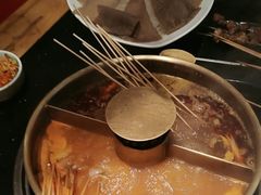 -明何记涮牛肚(品牌首店隋唐植物园南门古城路店)