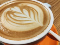 咖啡拿铁-百年朱苦拉咖啡(博物馆店)