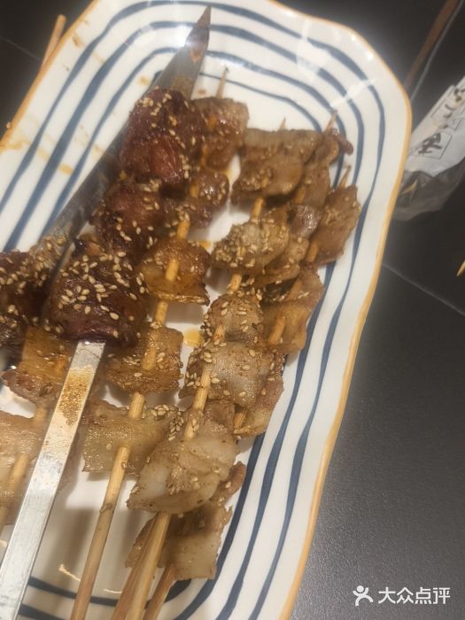 许哥东北烧烤·铁丳烤串·宫后夹肉(繁花中心店)图片