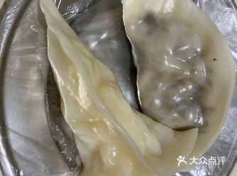 在东门转盘建设银行对面，非常不起眼的一家小店