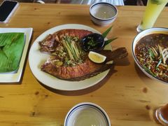 烤罗非鱼-蜗牛的家旅行主题云南菜餐厅.小酒馆(护国寺店)