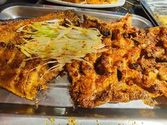烤鲶鱼-明何记涮牛肚(品牌首店隋唐植物园南门古城路店)