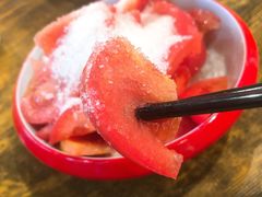 糖拌西红柿-老闵田螺馆·南昌特色小炒(梦时代店)