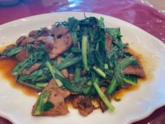 韭菜炒猪肝-侬佳蒸菜馆(听潮店)