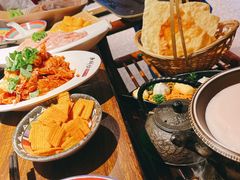 -老牌坊云南鱼豆花火锅(哈西万达店)