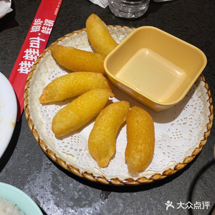 送一个凉菜，上面一层牛蛙