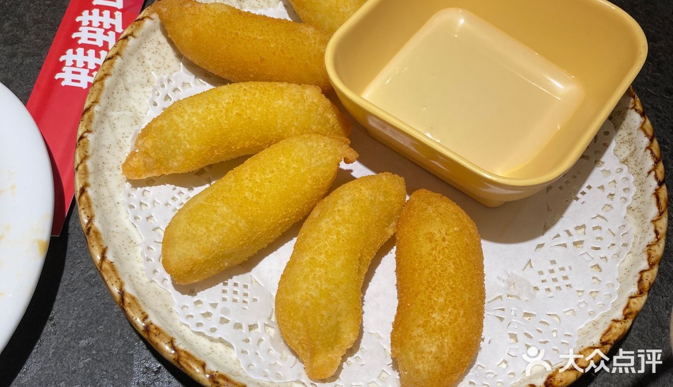 送一个凉菜，上面一层牛蛙