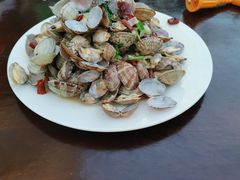 辣炒蛤蜊-1910老鲁味海鲜·戳子肉·青岛菜(金沙滩店)