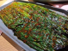 烤韭菜-街角等你.大连海鲜烧烤.经典铁板海鲜串(西安路店)