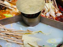 -明何记涮牛肚(品牌首店隋唐植物园南门古城路店)