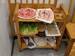 -明何记涮牛肚(品牌首店隋唐植物园南门古城路店)