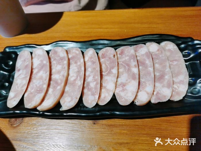 燚东北泥炉烤肉(六约深铁汇里店)台湾蒜香香肠图片