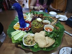 -沐毫傣泐云南菜孔雀宴•手抓饭傣味烧烤(曼听公园店)