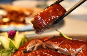 Litchi Wood Roasted Goose with Lamb's Head