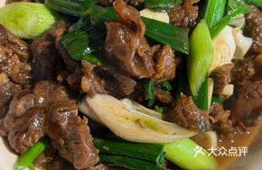 Braised Beef with Garlic Greens