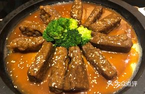 Black Tofu with Abalone Sauce on Hot Plate