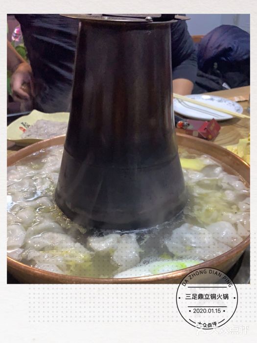 牛九铜火锅图片
