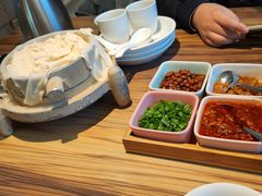 -九转小磨·非遗东北菜(万达广场店)