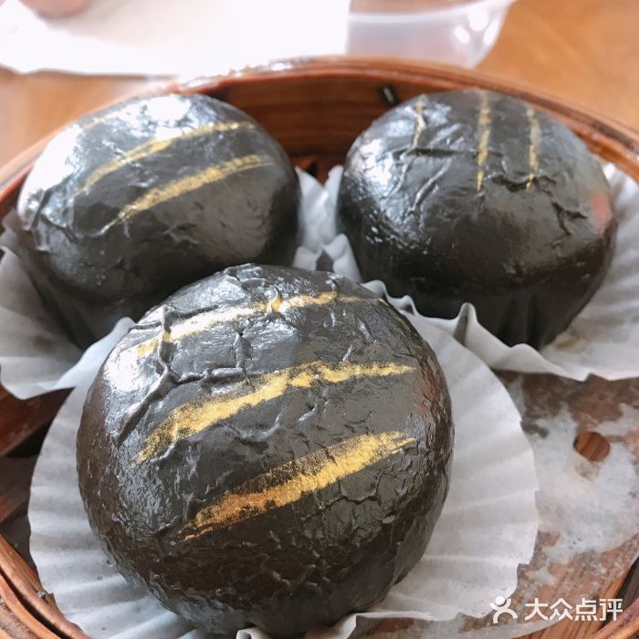 老周记茶点乌金流沙包图片