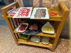 -明何记涮牛肚(品牌首店隋唐植物园南门古城路店)