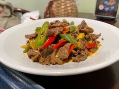 酸木瓜炒牛肉-紫滇源云南生态菜(丹凤街店)