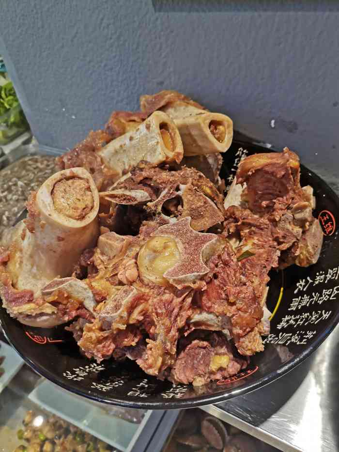 牛掌柜牛骨头馆-"饭店内设置有散台和包房,计价形式比较新颖.