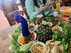 -沐毫傣泐云南菜孔雀宴•手抓饭傣味烧烤(曼听公园店)