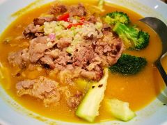 黄汁酸汤浸肥牛-港丽餐厅(高德置地店)