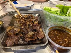 -喜悦小串丹东小黄牛海鲜烧烤大排档(民主广场店)