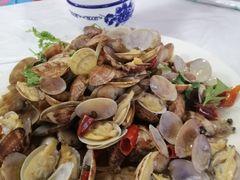 辣炒蛤蜊-1910老鲁味海鲜·戳子肉·青岛菜(金沙滩店)