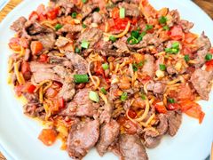 德宏酸木瓜炒牛肉-小喜客·云南特色菜(纳西庭院店)