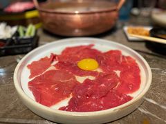 窝蛋肥牛-三人行骨头王火锅(长寿店)