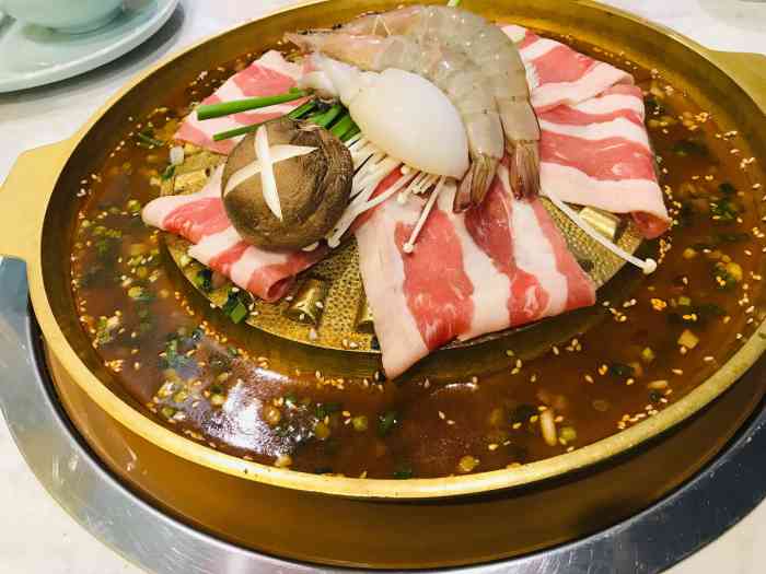 海囧水煎肉(茂业天地店)-"【环境】在胜利门茂业的七楼,店里装饰以蓝.