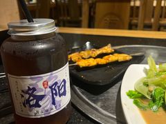 -明何记涮牛肚(品牌首店隋唐植物园南门古城路店)